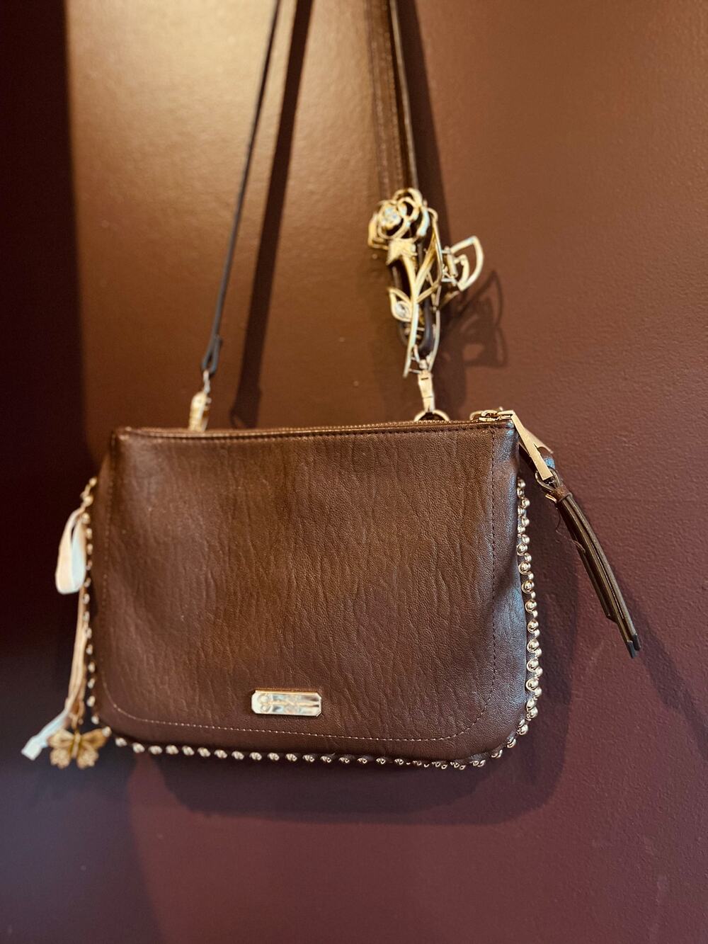 Pristine condition Brown and gold purse with Leopard print interior